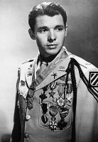Murphy wearing the U.S. Army khaki "Class A" uniform with full-size medals, 1948.
