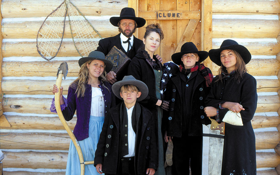 Gordon and Adrienne Clune (back) with their three children (left to right) Aine, Justin and Conor with niece Tracy (right) on their 1883 dress.