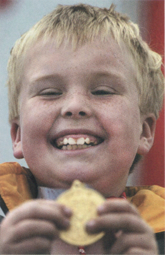 <em>Bryan Doran, from Newtown Cunningham, Co. Donegal, celebrates on June 23 after winning a gold medal in the final round of softball.</em>