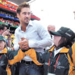 Colin Farrell is escorted by Team Ireland.