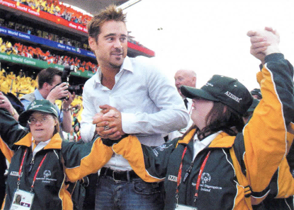 Colin Farrell is escorted by Team Ireland.