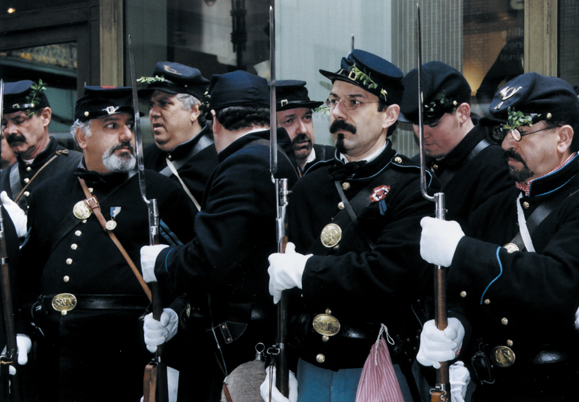 <em>The Irish Brigade reenactors lining up outside Grand Central Station, put on their gloves and get ready to join The St. Patrick's Day Parade.</em>