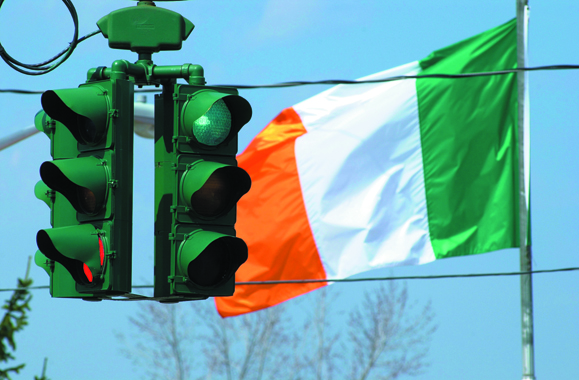 <em>The Tipperary Hill traffic light in Syracuse, New York that is green on the top instead of red. Walsh's father Jack Walsh, a proud Irish-American, hailed from this area.</em>