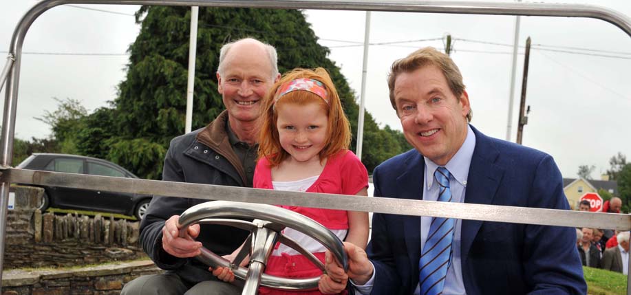 Bill Ford pictured with some Irish Fords, Henry Dan Ford and Hannah Ford O’Brien, 5, who turned out to meet him when he visited Ballinascarty, Co. Cork, birthplace of his great-great-grandfather William Ford.