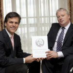 Sean Connick, chairman of the JFK Trust, New Ross presenting the Kennedy Summer School program to Tim Shriver, son of Eunice Kennedy and Sargent Shriver. Photo: Fennell Photography.