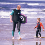 Enjoying the surf on the beach at Bundoran. Courtesy of Tourism Ireland.