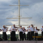 Fiddlers on the banks of the Miramichi. Photo: John Kernaghan.