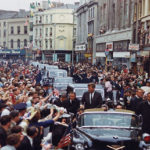 President Kennedy's motorcade drives through Cork during his 1963 trip to Ireland.