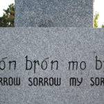 The engraving on the Middle Island celtic cross memorial. Photo: John Kernaghan.