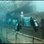 Divers explore Andreas Franke's exhibition "The Sinking World" in the USS Vandenberg. Photo: Andreas Franke.