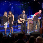 The Merry Men and guest performers at the Indoor Garden Party in New York, October 2012. L-R: Moley O’Suilleabhain, Alan Doyle, Roberta Duchak, Samantha Barks, Russell Crowe, Kevin Durand, Scott Grimes, Owen O’Suilleabhain.