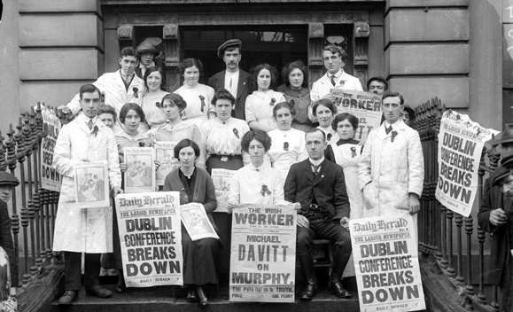 Rosie Hackett and Delia Larkin (front, center) with workers on the steps of Liberty Hall