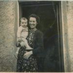 With his mother, Meg, in front of their thatched cottage home in Knockaderry, Limerick.