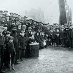 Crowds wait on the docks for food ships during the 1913 Lock-Out