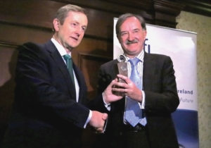 Taoiseach Enda Kenny presenting FitzGerald with the Inaugural Science Foundation Ireland Award this past March.