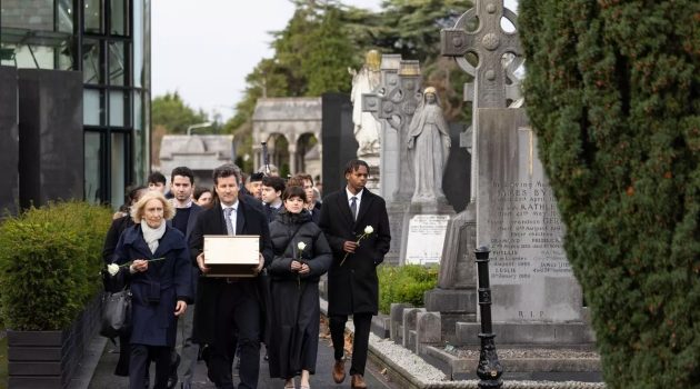 Chuck Feeney's wife Helga and son Patrick lead the Procession in Glasnevin Cemetery on Friday, December 9, 2023. Photo: Naoise Culhane