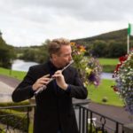 Michael Flatley plays a traditional wooden flute for "The Rising"