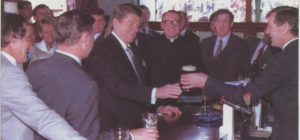 President Reagan has a pint of Smithwicks to toast his arrival in Ballyporeen.