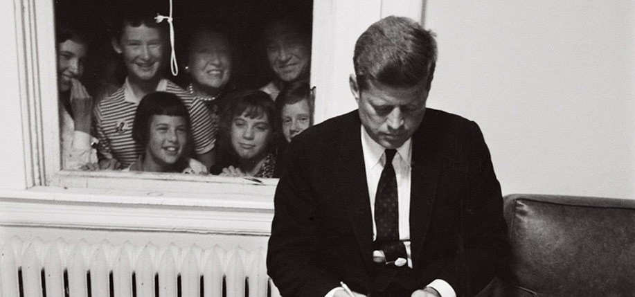 Senator John F. Kennedy checking over a speech during the Presidential campaign with some unexpected guests. (Photo: Paul Schutzer/The LIFE Picture Collection/Getty Images)