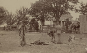 Union soldiers bringing in the wounded.