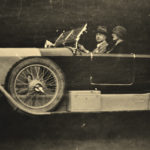 Oliver St. John Gogarty, pictured driving one of his many cars.