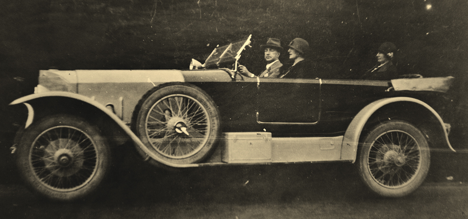 Oliver St. John Gogarty, pictured driving one of his many cars.