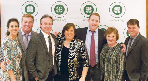 <em>Joanie with her mother, Helen Madden, four of her brothers: John, Patrick, Joe, and Kevin Madden, and her sister-in-law, Lisa.</em>