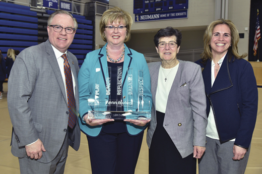 <em>Eileen accepted the 2017-2018 Neumann University Institute for Sport, Spirituality and Character Development Award. Pictured: Dr. Chris Domes (President of Neumann University); Eileen McDonnell; County Sligo native Sr. Marguerite O’Beirne, OSF (VP for Mission and Ministry); and Lee Delle Monache (Director of Neumann’s Institute).</em>