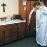 Fr. Michael Collins gets ready for mass.