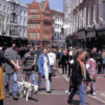 Tourists stroll along Grafton Street in the heart of Dublin.