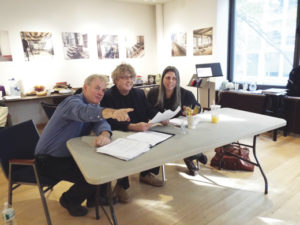 Ciarán O'Reilly, in the act of directing The Dead with Paul Muldoon and novelist Jean Hanff Korelitz, who had the idea to do James Joyce's short story as an immersive theater production.