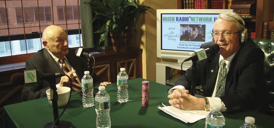 Adrian Flannelly (right) broadcasting from his New York studio with former New York City mayor Ed Koch.