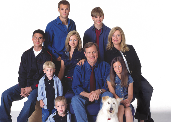 <em>Cast of <strong>7th Heaven</strong> Pictured (left to right back row): George Stults as Kevin, David Gallagher as Simon Camden, (middle row) Adam LaVorgna as Robbie Palmer, Beverly Mitchell as Lucy Camden, Catherine Hicks as Annie Camden, (bottom row) Lorenzo and Nicholas Brino as David and Sam Camden, Stephen Collins as Eric Camden, Mackenzie Rosman as Ruthie Camden, Happy the Dog as Happy. </em>