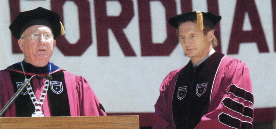 Father O'Hare with actor Liam Neeson who received an honorary Doctor of Fine Arts degree.