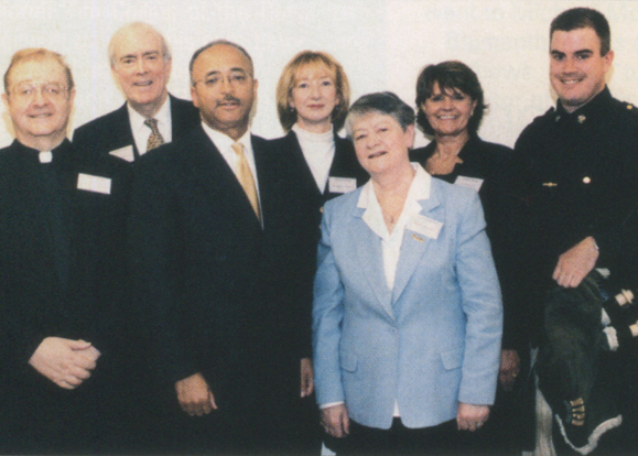 Honored by the Comptroller of the City of New York were (back row from left to right): James P. Murphy, Patricia Harty, Kathy E. Ryan, and police officer and Emerald Pipe Band member Andy McEnvoy. Front row left to right: Father Sean McManus, Comptroller William C. Thompson and Mary Nolan.