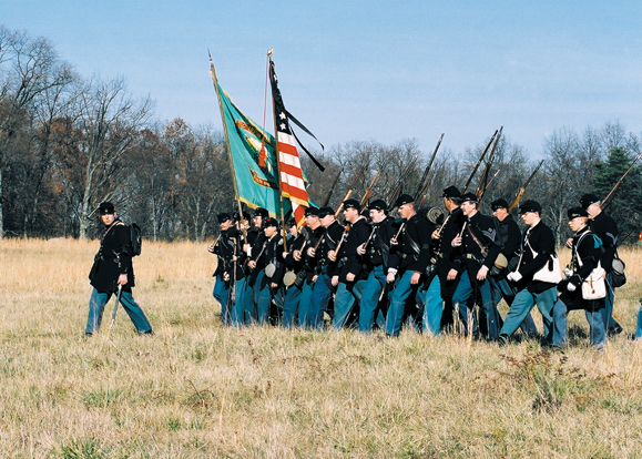Irish Brigade reenactors retrace the steps of the 69th New York State Volunteers through the Wheatfield at Gettysburg on Remembrance Day, Nov. 2002 - photo by Jim Maher.