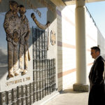 John Kelly, trustee of Uniformed Firefighters Association, at the Brooklyn Wall of Remembrance. The wall is engraved with images of the 115 Brooklyn firefighters who lost their lives on 9/11.