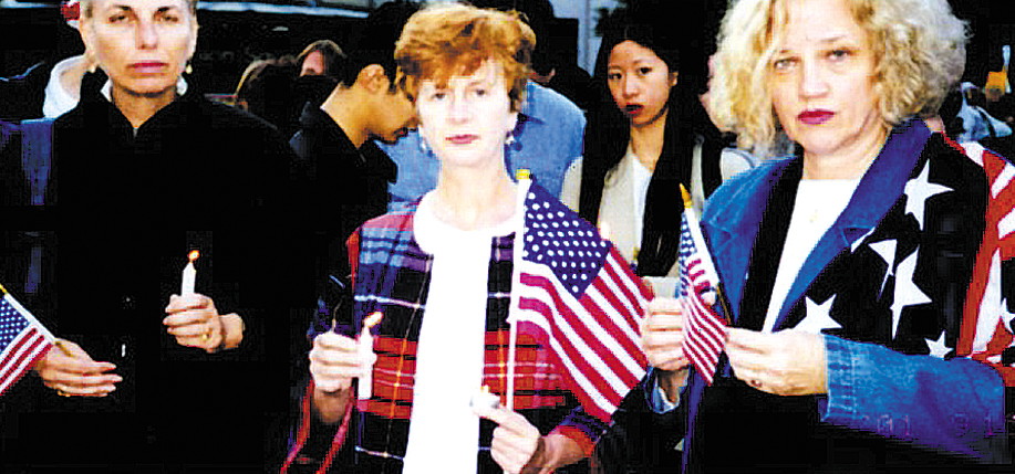 Maura Muligan (center) with friends Peggy and Pat, at the candle light ceremony at Union Square on the night of September 13.