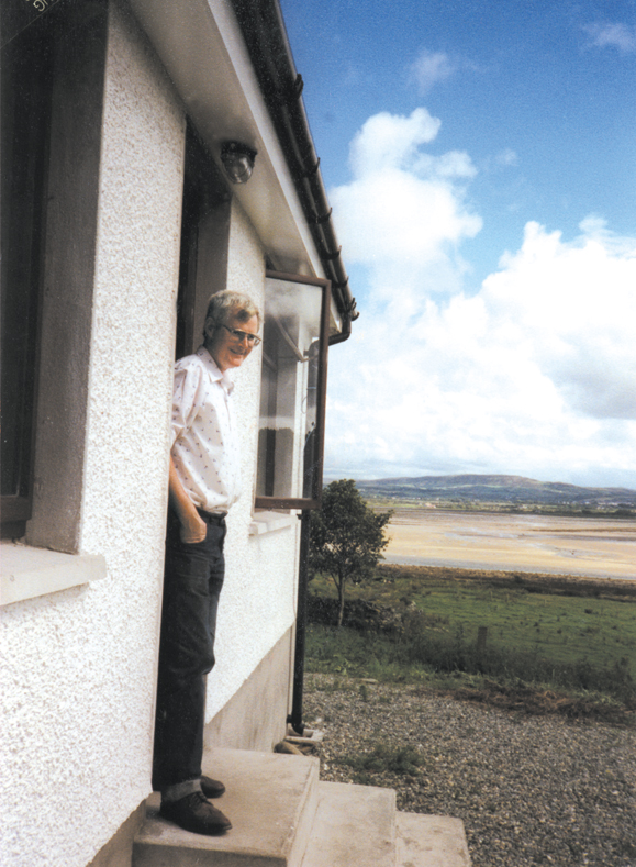 <em>Paddy on the steps of his home overlooking the Isle of Doagh.</em>
