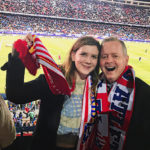 Maggie Holland and her father Dan at an Atlético Madrid game while on a trip to Spain in February 2017.