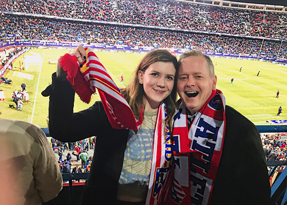 Maggie Holland and her father Dan at an Atlético Madrid game while on a trip to Spain in February 2017.