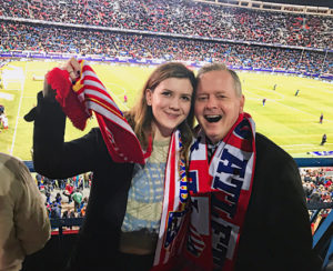 Maggie Holland and her father Dan at an Atlético Madrid game on a trip to Spain in February 2017.