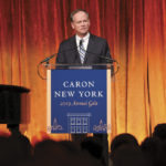 John Greed addresses the gathering. (Photos by Samantha Nandez and Vladimir Weinstein, BFA.com).