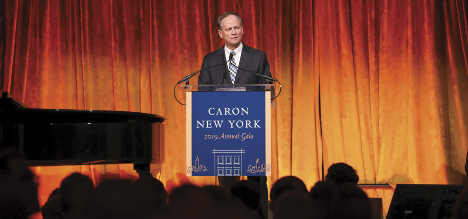 John Greed addresses the gathering. (Photos by Samantha Nandez and Vladimir Weinstein, BFA.com).