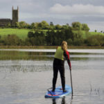 Pam Martin and Eddie Hawkins of Wild Rover Adventures paddle the River Quoile towards Down Cathedral, where St. Patrick is buried.