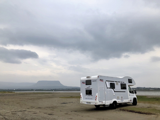 The big camper van, nicknamed "Maury," at rest on a quiet bay near Sligo.