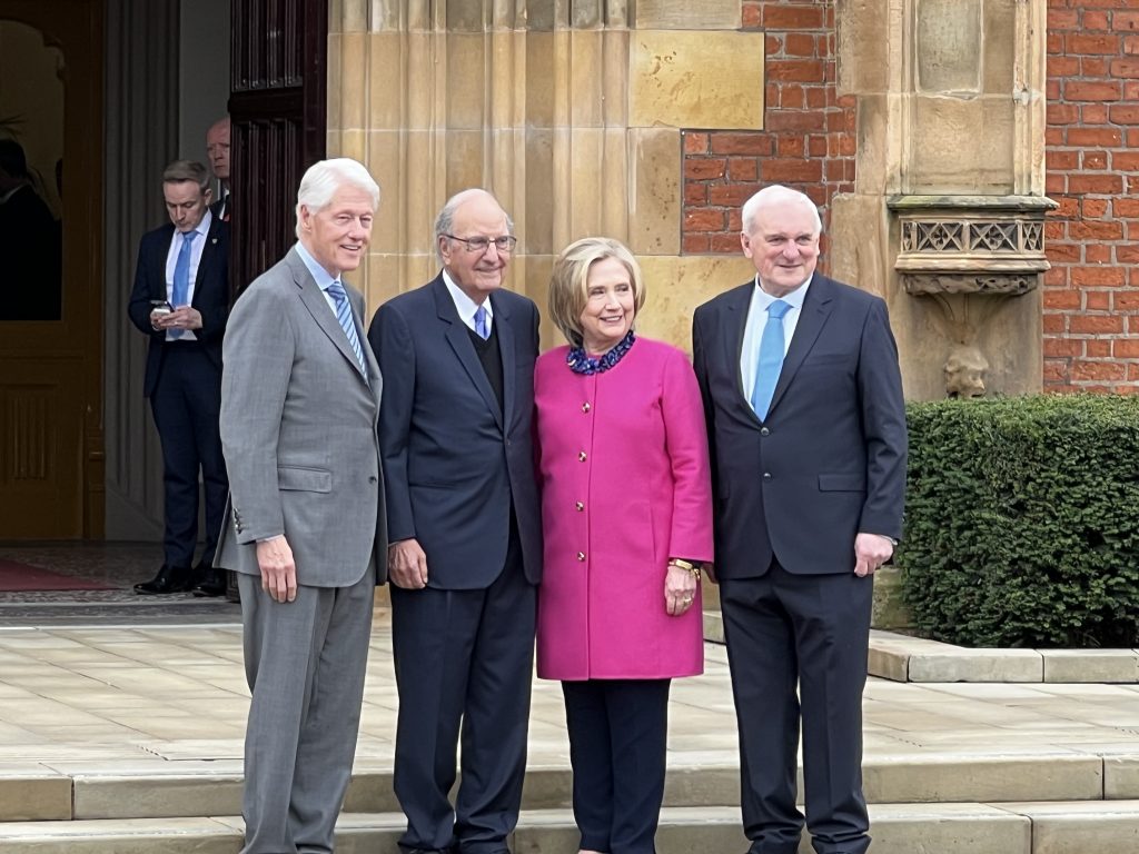 President Bill Clinton, Senator George Mitchell, Secretary of State Hillary Clinton, and Taoiseach Bertie Ahern