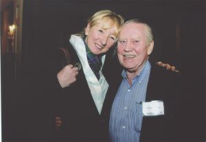 Irish-America magazine's co-founder and editor Patricia Harty shares a moment with Chuck Feeney at an Irish America event in 2013.