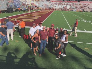 McLaughlin at a Boston College football game with the board of the BC Alumni Association.