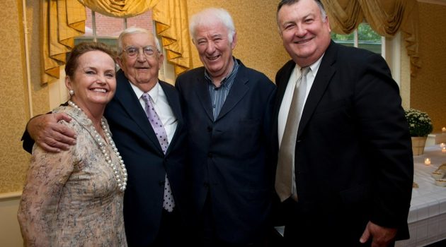 Thomas Quinlan at Glucksman Ireland House in September 2011 with Loretta Brennan Glucksman, Seamus Heaney, and his son Joe Quinlan.